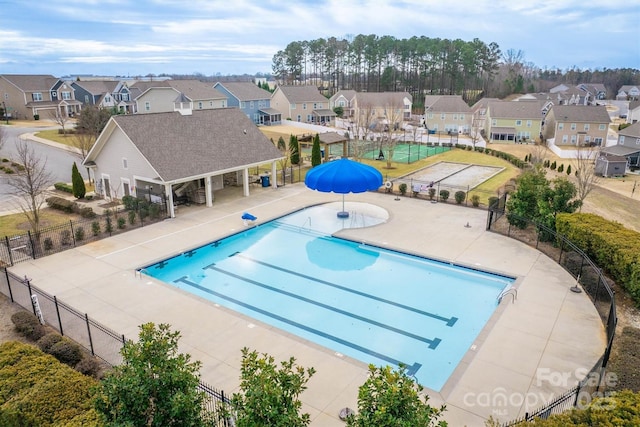 view of swimming pool with a patio