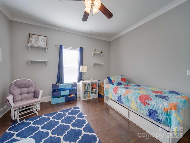 bedroom featuring dark hardwood / wood-style flooring, crown molding, and ceiling fan