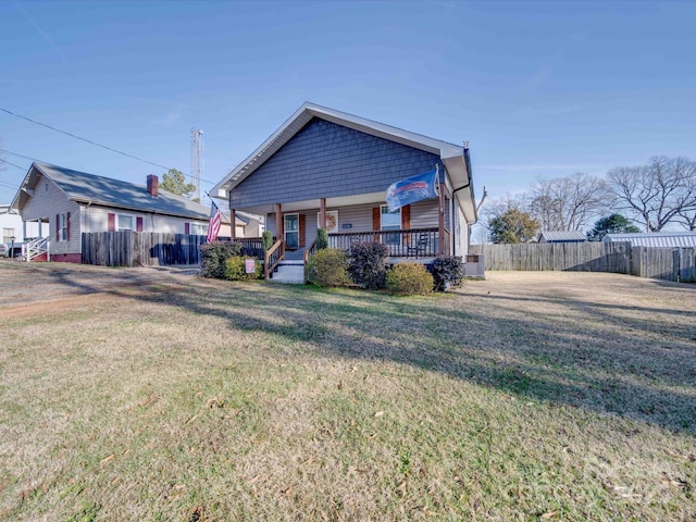 back of property featuring a yard, a deck, and central air condition unit