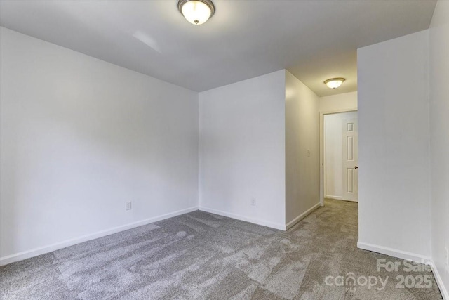 empty room featuring carpet flooring