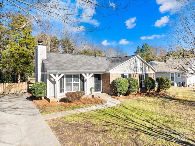 ranch-style house with a front yard