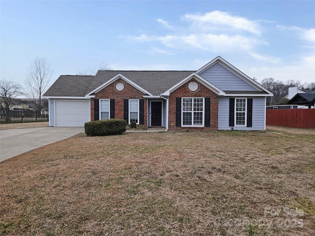 ranch-style home with a garage and a front yard