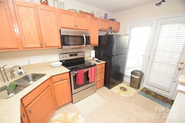 kitchen with sink and stainless steel appliances