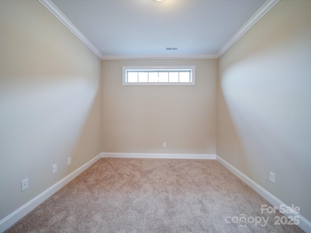 carpeted empty room with crown molding