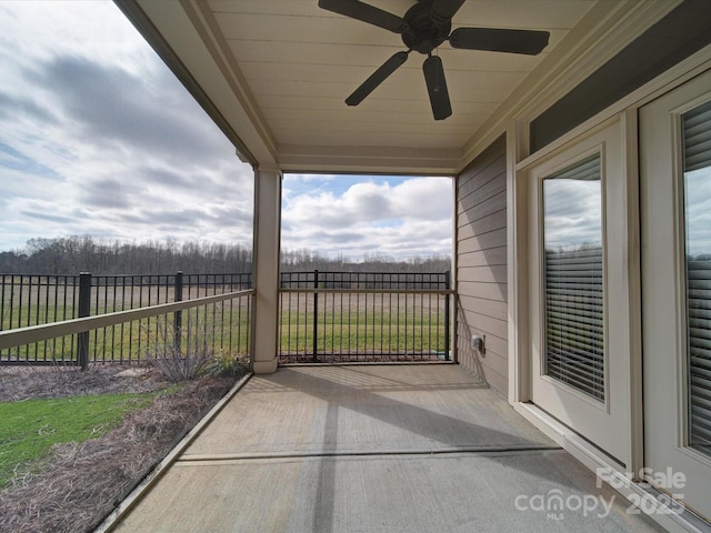 view of patio / terrace featuring ceiling fan