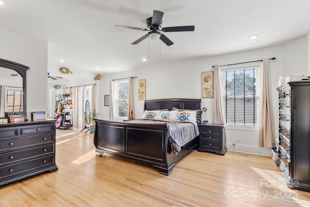 bedroom featuring ceiling fan and light wood-type flooring