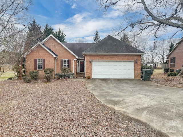 single story home featuring a garage