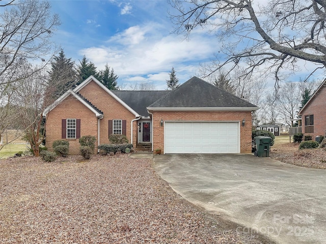 ranch-style house featuring a garage