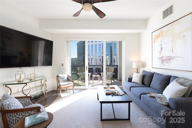 living room featuring ceiling fan