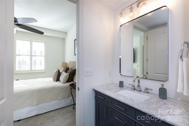 bathroom featuring vanity and ceiling fan