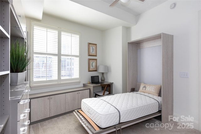 bedroom with multiple windows, carpet floors, and ceiling fan