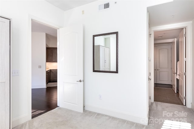 unfurnished bedroom with carpet flooring