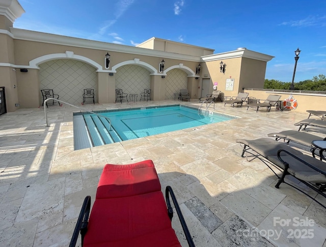 view of pool with a patio