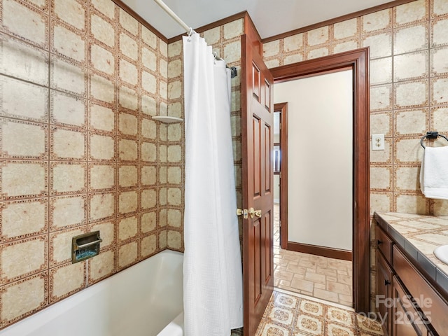 bathroom featuring vanity and shower / bath combination with curtain