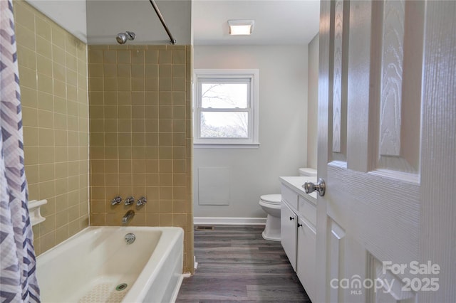 full bathroom featuring toilet, vanity, shower / bathtub combination with curtain, and hardwood / wood-style floors