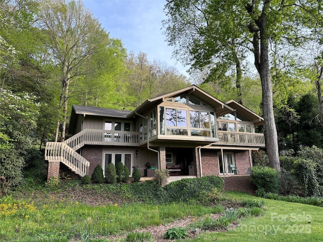 back of property with a patio