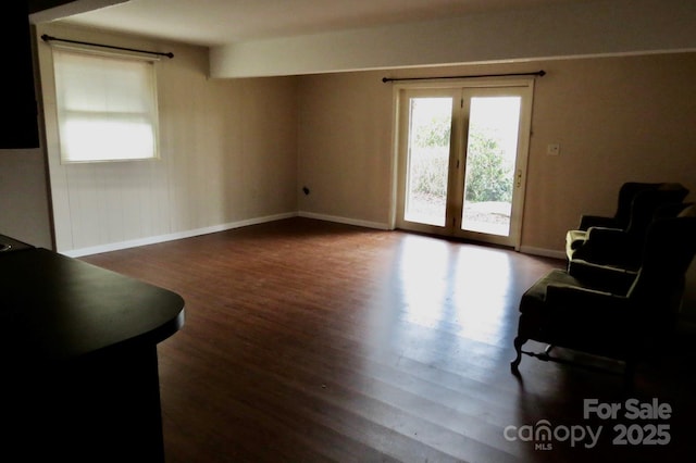 living room featuring dark hardwood / wood-style floors