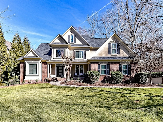 view of front of home with a front lawn