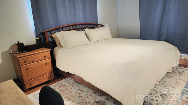 bedroom featuring hardwood / wood-style flooring