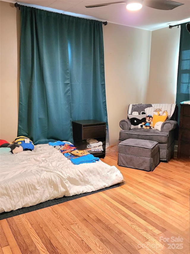 bedroom with light wood-type flooring