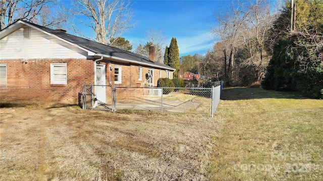 view of property exterior featuring a yard