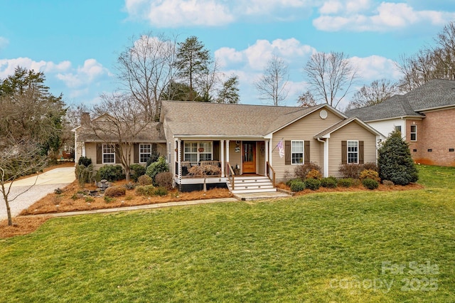 ranch-style house with a front yard and a porch