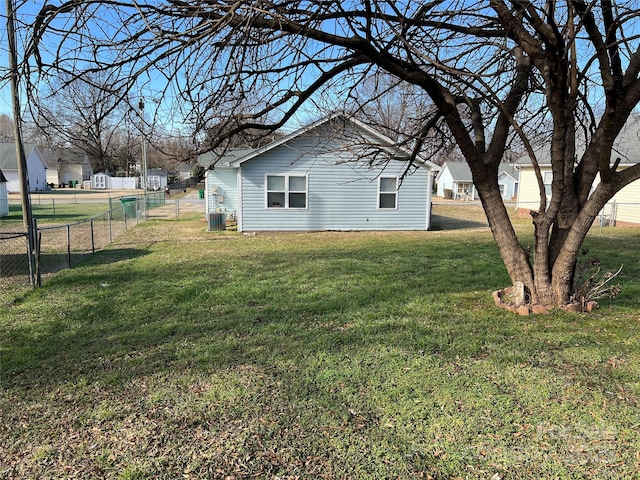 view of yard with central AC