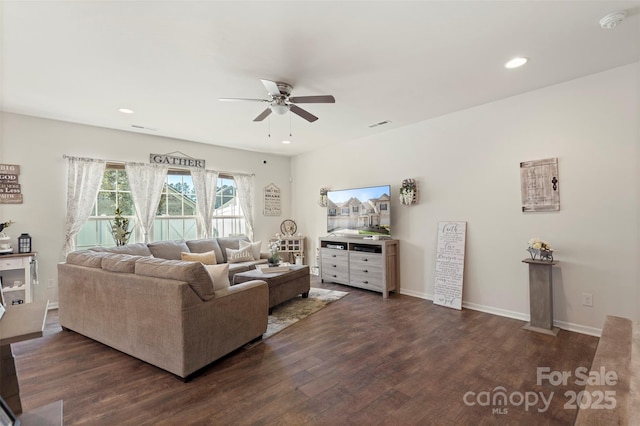 living area with visible vents, baseboards, recessed lighting, dark wood-style flooring, and ceiling fan