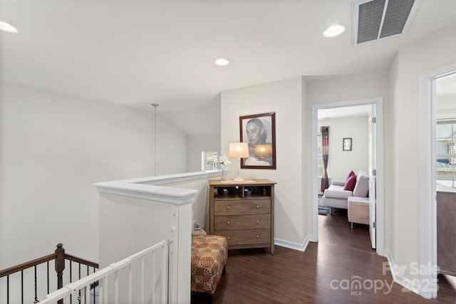 hallway featuring visible vents, baseboards, an upstairs landing, recessed lighting, and dark wood-style flooring