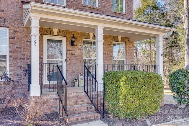 entrance to property with a porch