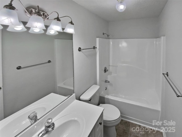 full bathroom with shower / tub combination, vanity, toilet, tile patterned floors, and a textured ceiling