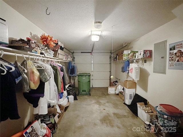 garage featuring a garage door opener and electric panel