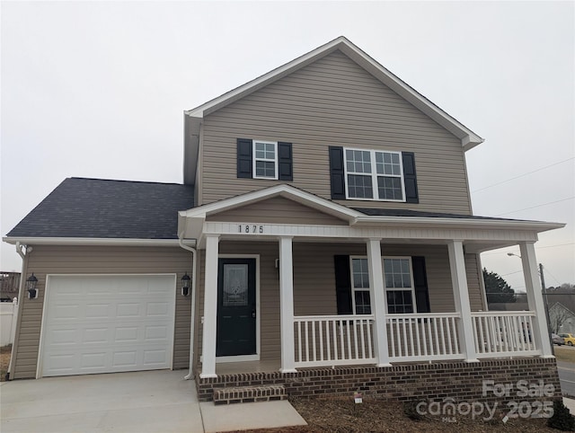 view of front of house featuring an attached garage, driveway, a porch, and roof with shingles