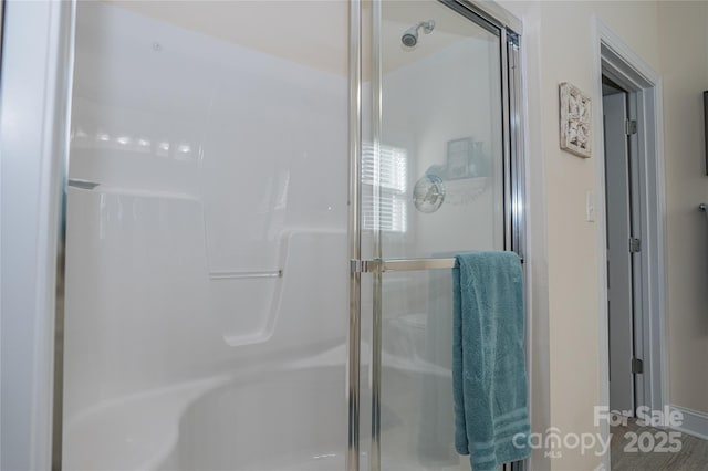 bathroom featuring walk in shower