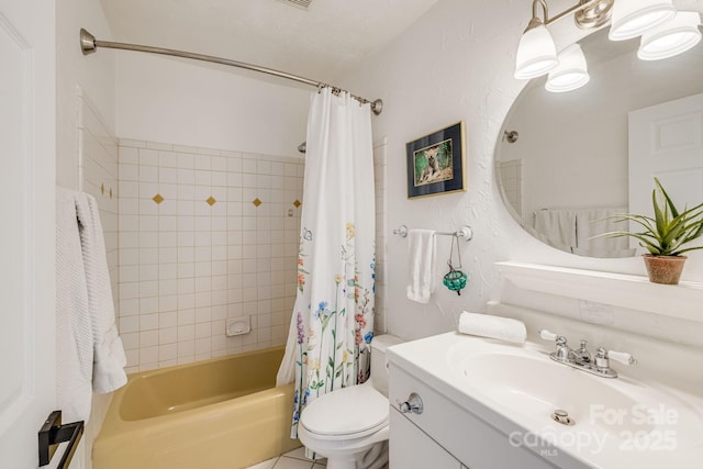 full bathroom with vanity, toilet, and shower / bath combo with shower curtain