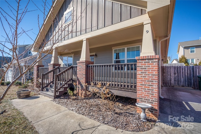 doorway to property with covered porch