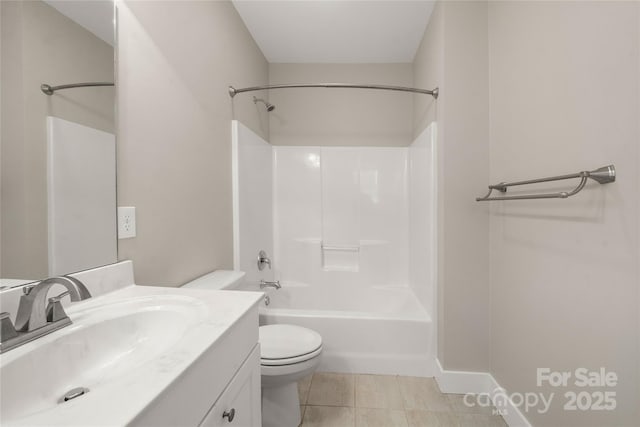 full bathroom featuring vanity, tile patterned floors, washtub / shower combination, and toilet