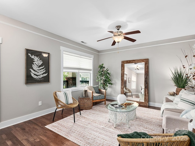9 Hyde Park Pl, Arden, NC 28704 - living area with healthy amount of natural light, baseboards, dark wood finished floors, a ceiling fan, and crown molding