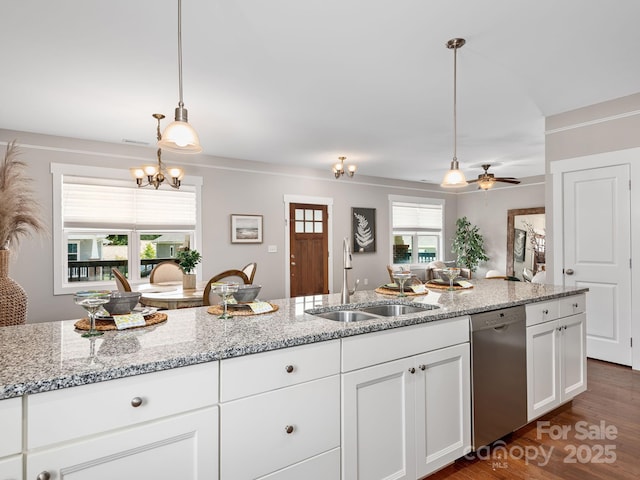 9 Hyde Park Pl, Arden, NC 28704 - kitchen featuring stainless steel dishwasher, a sink, white cabinets, light stone counters, and hanging light fixtures