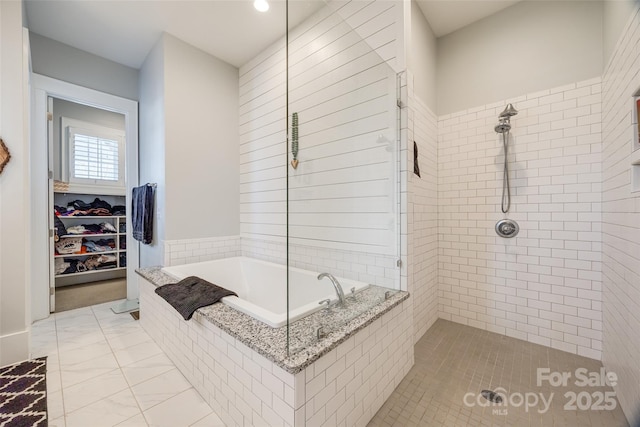 bathroom with independent shower and bath