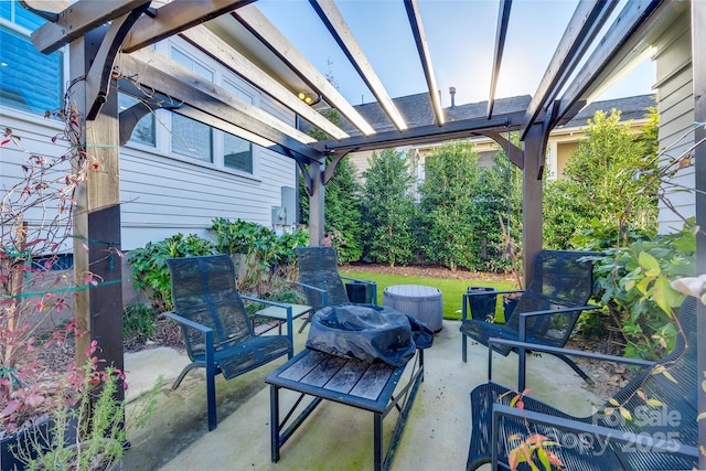 view of patio featuring a pergola