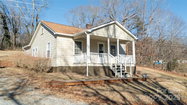 bungalow-style home with covered porch