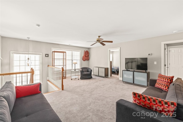 living room featuring light colored carpet