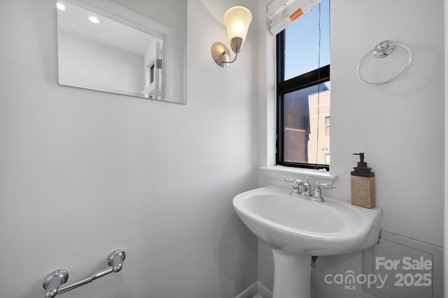 bathroom featuring a wealth of natural light