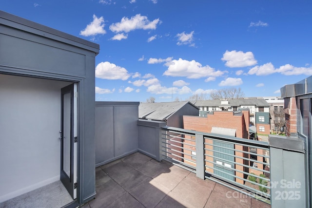 balcony featuring a residential view