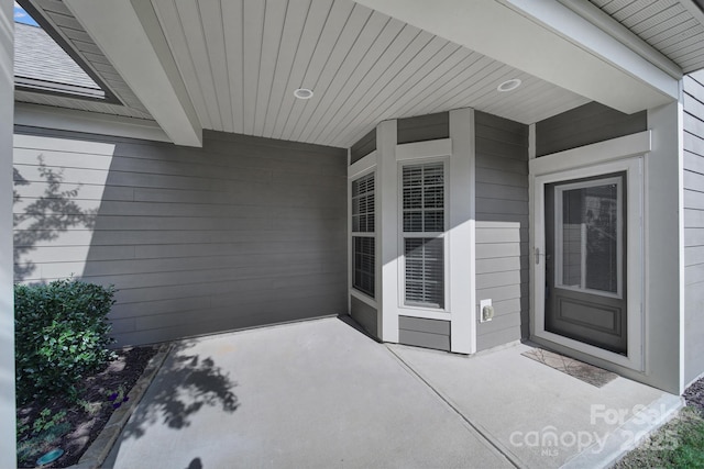 doorway to property featuring a patio area