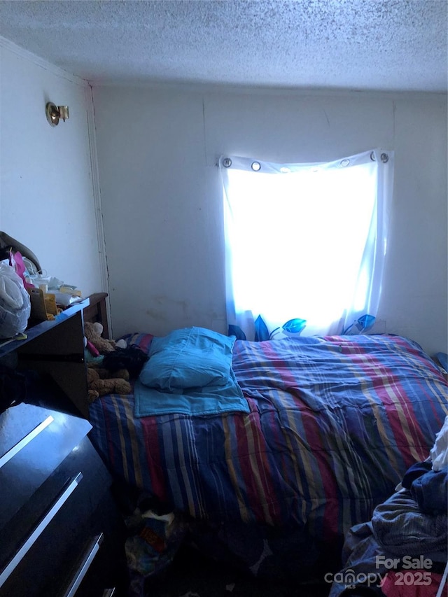 bedroom with a textured ceiling