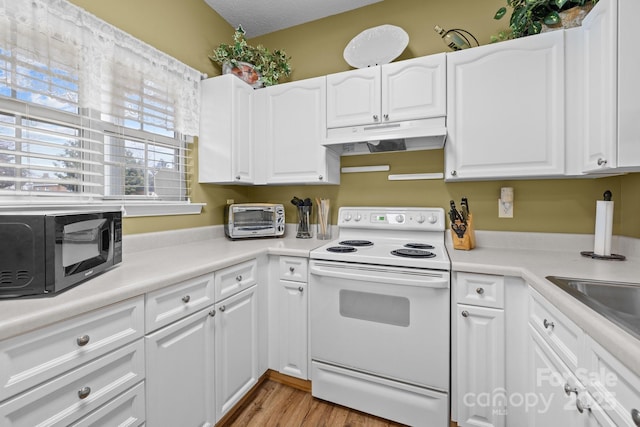 kitchen with white cabinetry, white range with electric cooktop, sink, and light hardwood / wood-style flooring