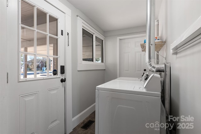 laundry area featuring washing machine and dryer