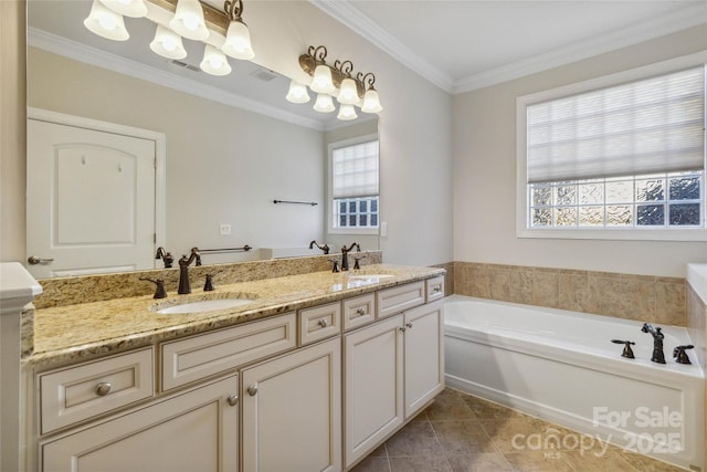 bathroom featuring crown molding, a bathing tub, vanity, and tile patterned floors